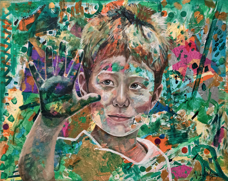 Family gathered around a shared painted canvas in Nicky Myny's studio